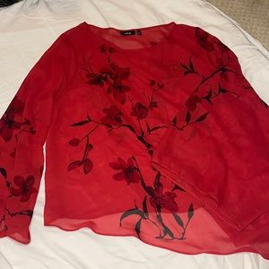 Red flowy top